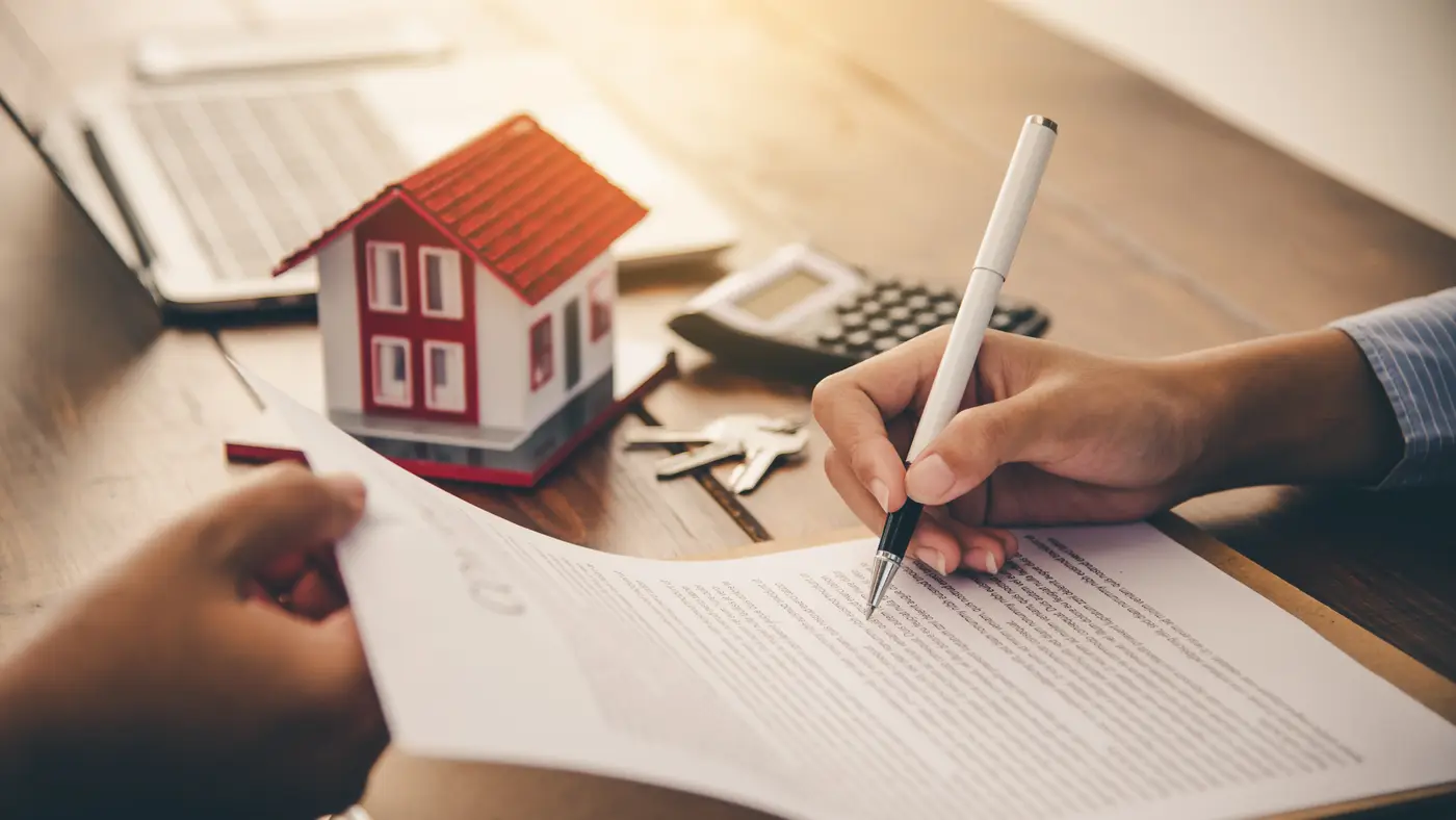 A person signing a contract
