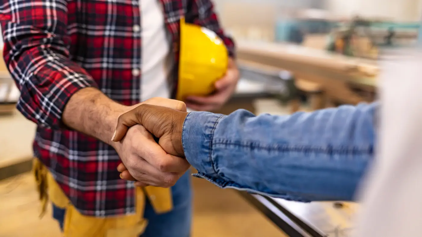 Two Contractors Hand Shaking